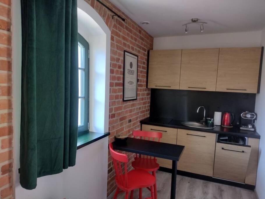 A, Starowka Mikroapartament Miodova Apartment *